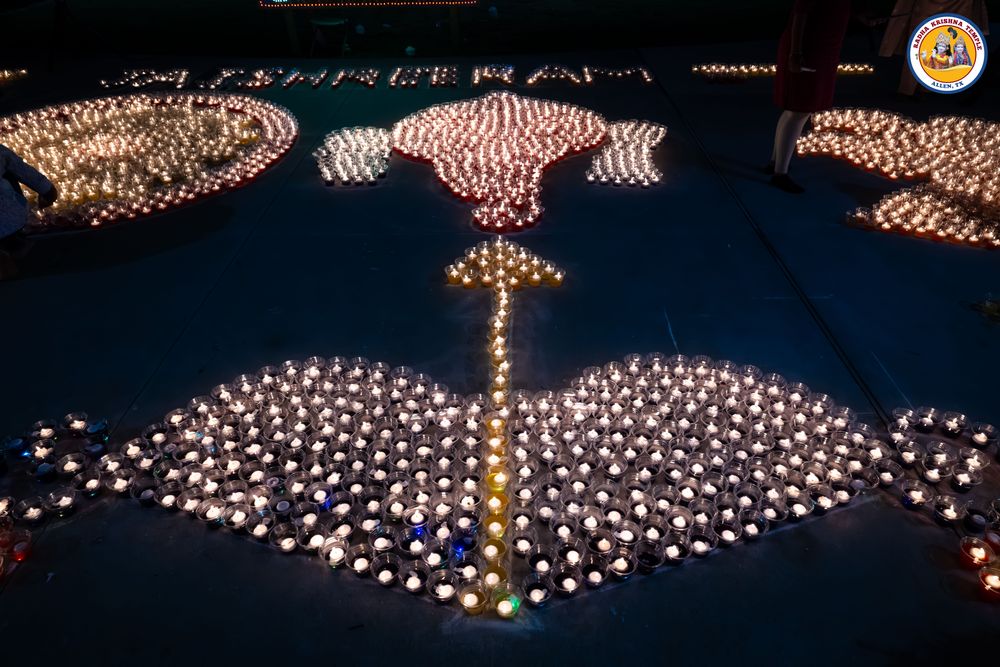 Diyas laid out in a large glowing pattern on the temple grounds